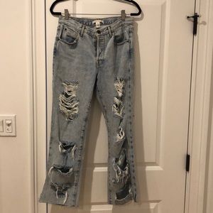 Extremely distressed Alice & Olivia denim jeans